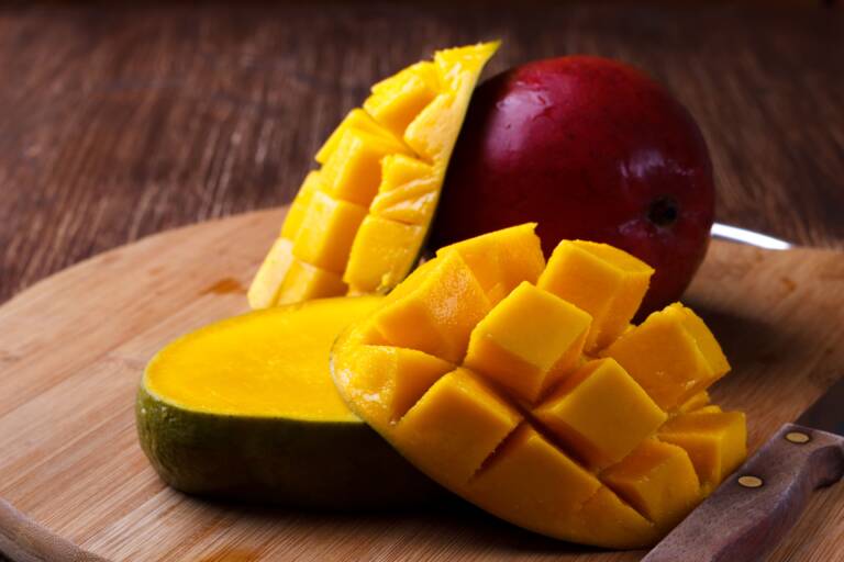 fresh-mango-on-wooden-board-2026-03-25-10-48-43-utc